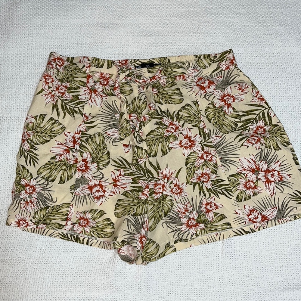 Volcom beach shorts, floral pattern, elastic waist in back, tie front